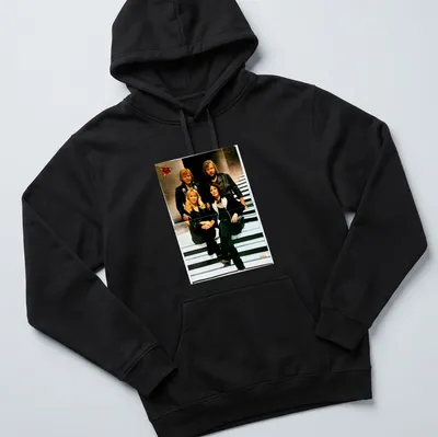 Retro ABBA t-shirt with bold lettering and classic colors — printed on a unisex hoodie