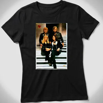 Retro ABBA t-shirt with bold lettering and classic colors — printed on a women's shirt