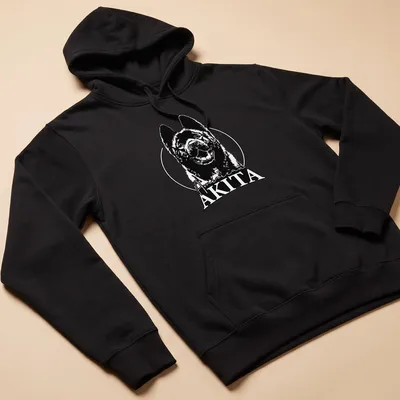 Bold line-art of an American Akita dog with text American AKITA — printed on a unisex hoodie