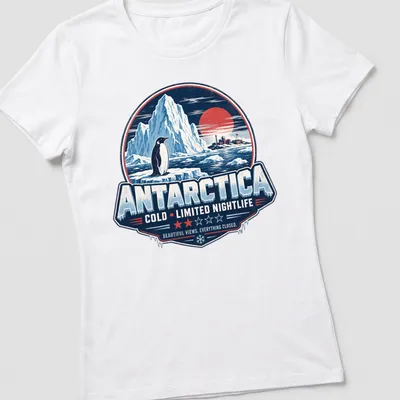 Vintage retro design featuring a penguin with humorous text about nightlife in Antarctica — printed on a women's shirt