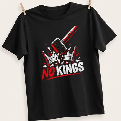 Grunge style t-shirt featuring the text NO KINGS with a gavel and crowns graphic