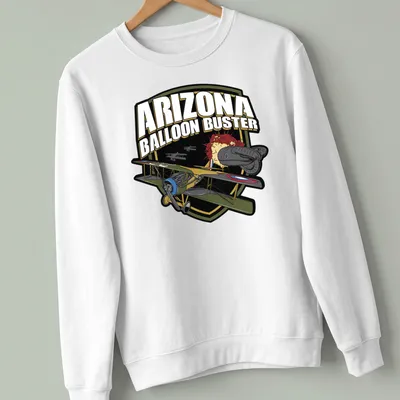 Bold graphic t-shirt featuring an airplane and colorful design elements. — printed on a unisex sweatshirt