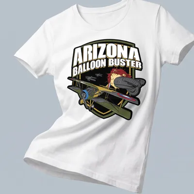 Bold graphic t-shirt featuring an airplane and colorful design elements. — printed on a women's shirt