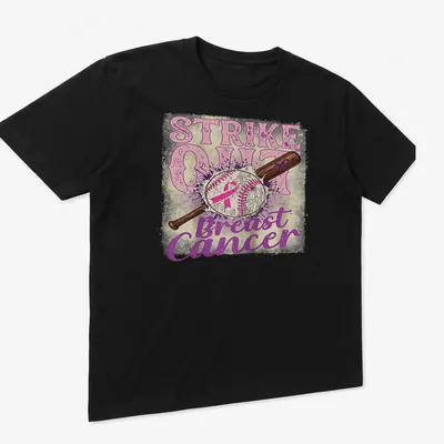Vintage distressed shirt with baseball bat and ball around the text Strike Out Breast Cancer — printed on a unisex t-shirt (angled view)