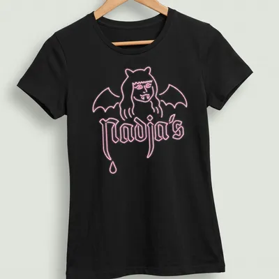 Neon pink Bat Woman design featuring the text Nadja's in bold typography. — printed on a women's shirt