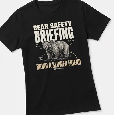 Illustrative t-shirt featuring a bear with humorous bear safety tips. — printed on a women's shirt