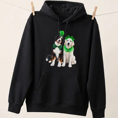 Festive St. Patrick's Day t-shirt featuring a Bernese Mountain Dog and Golden Retriever — printed on a unisex hoodie