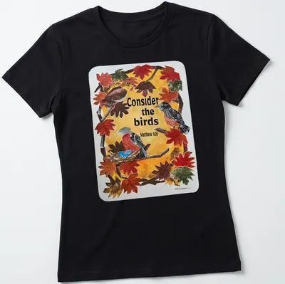 Collage of birds among autumn leaves with the text: Consider the birds Matthew 6:26 — printed on a women's shirt