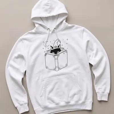Line art of a black cat reading a book while wearing a witch hat — printed on a unisex hoodie