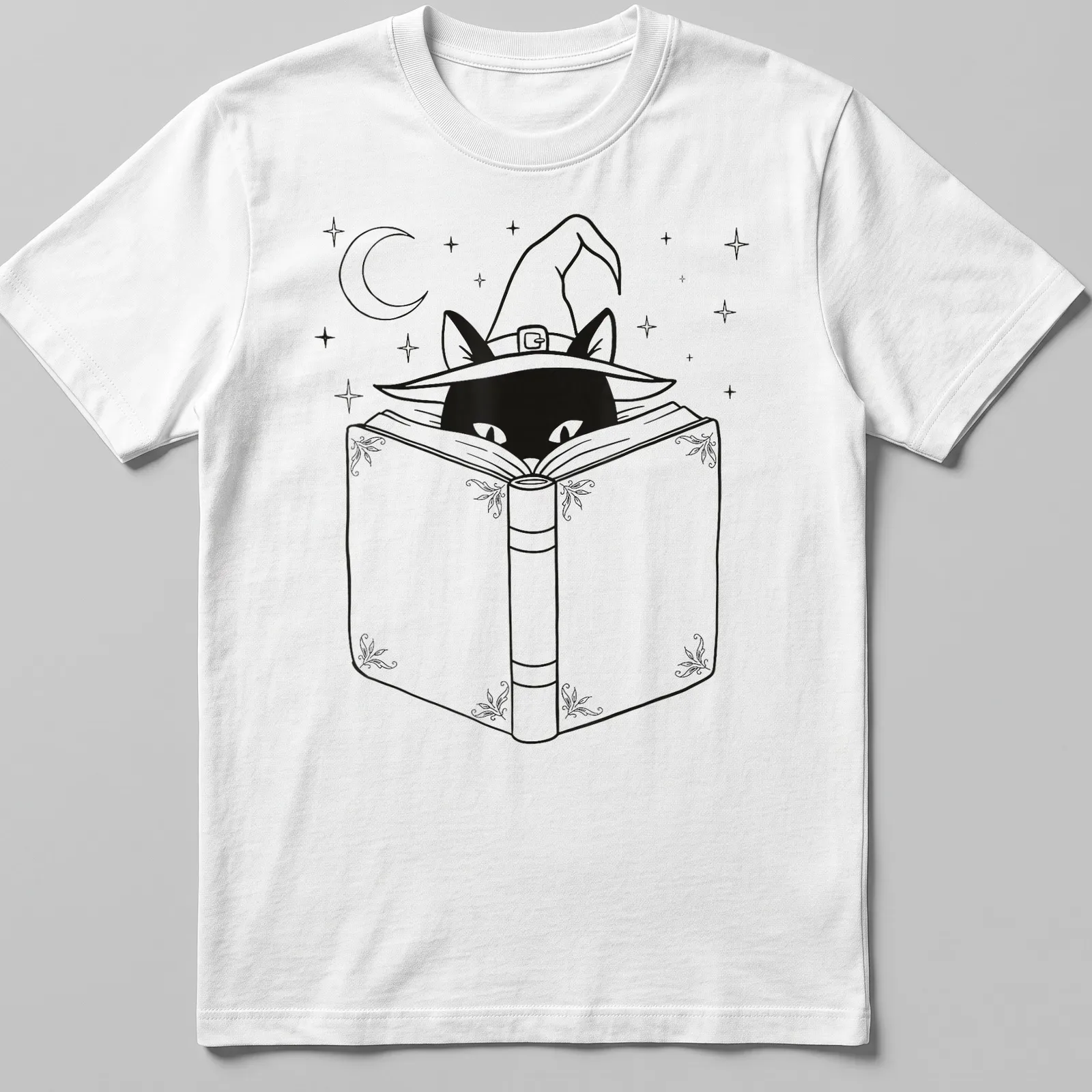 Line art of a black cat reading a book while wearing a witch hat — printed on a unisex t-shirt