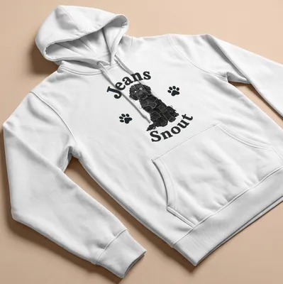 Illustration of a black dog with a denim patch snout and bold text above. — printed on a unisex hoodie