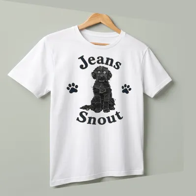 Illustration of a black dog with a denim patch snout and bold text above. — printed on a unisex t-shirt (angled view)