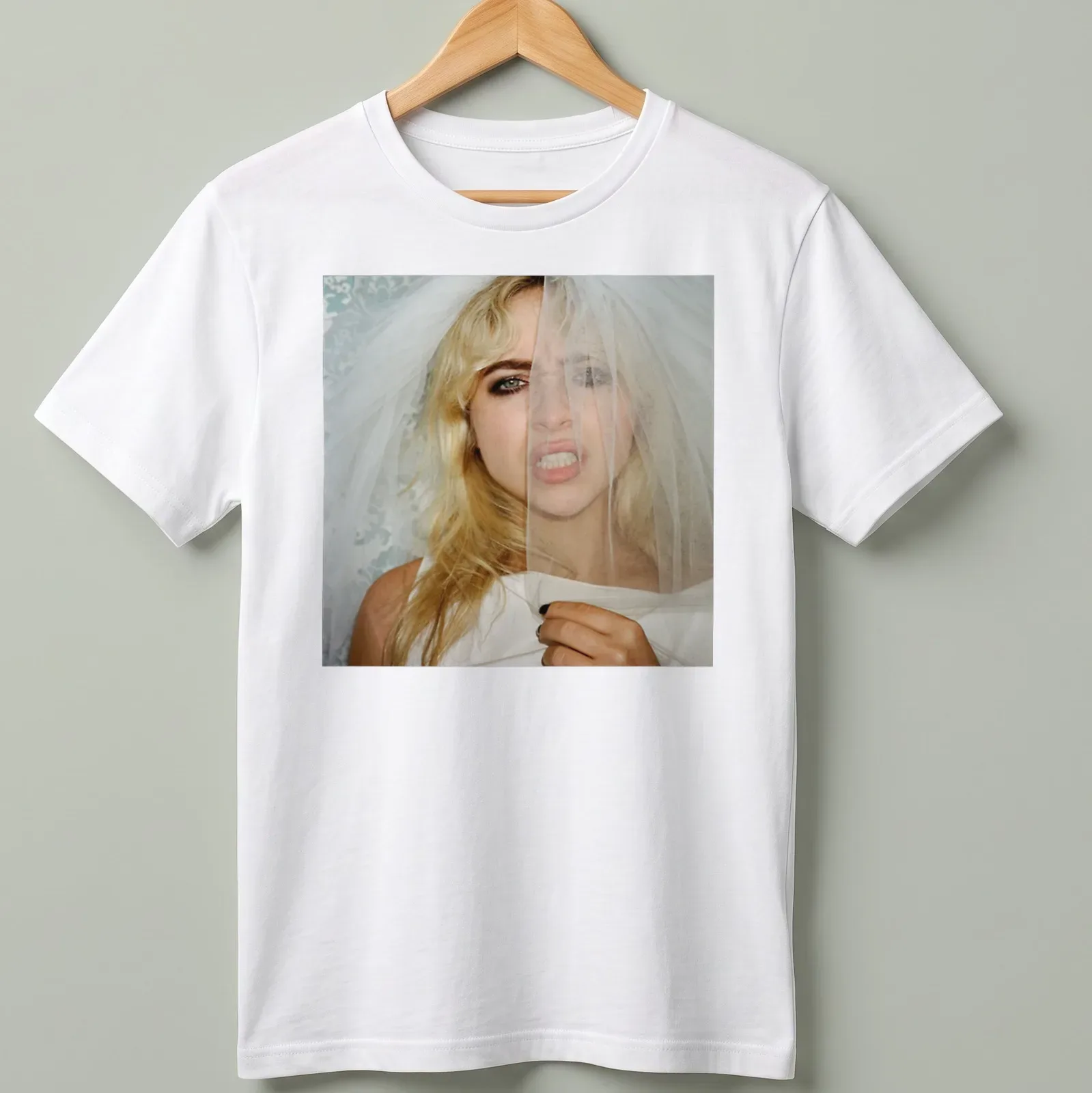 Photographic bridal fashion portrait featuring a model in a veil. — printed on a unisex t-shirt
