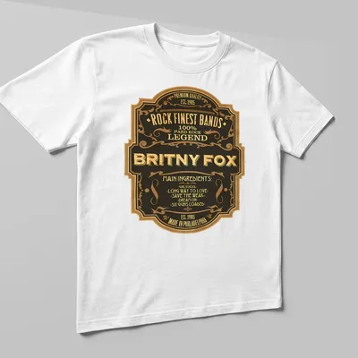 Vintage badge shirt featuring Britny Fox and their song titles in black, gold, and cream. — printed on a unisex t-shirt (angled view)