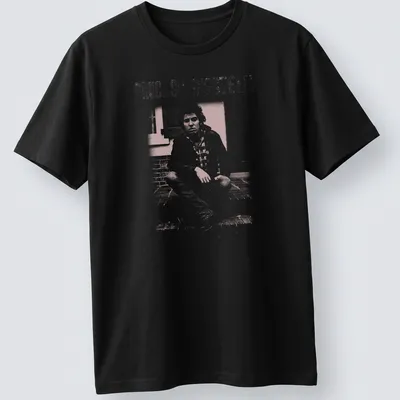 Fanart style t-shirt featuring Bruce Springsteen's name in white and light pink