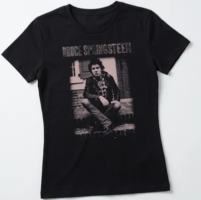 Fanart style t-shirt featuring Bruce Springsteen's name in white and light pink — printed on a women's shirt