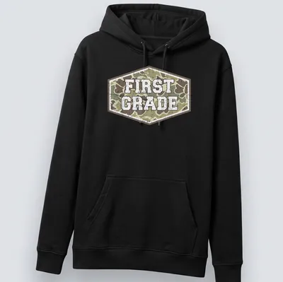 Vintage camo print t-shirt with 'FIRST GRADE' in bold lettering — printed on a unisex hoodie