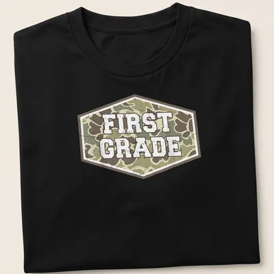 Vintage camo print t-shirt with 'FIRST GRADE' in bold lettering