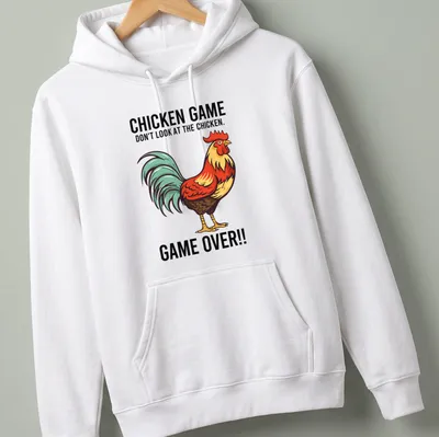Vintage cartoon style Chicken Game t-shirt with colorful rooster and humorous text — printed on a unisex hoodie