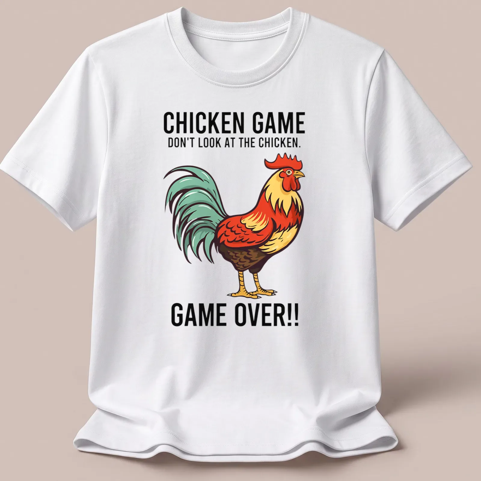 Vintage cartoon style Chicken Game t-shirt with colorful rooster and humorous text — printed on a unisex t-shirt