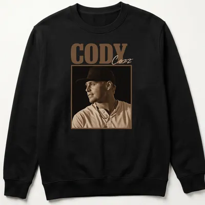 Vintage sepia t-shirt with the text Cody Cozz in brown and cream — printed on a unisex sweatshirt