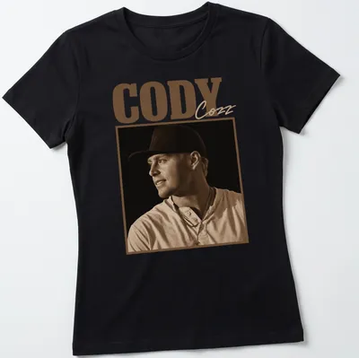 Vintage sepia t-shirt with the text Cody Cozz in brown and cream — printed on a women's shirt
