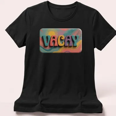 Vibrant retro t-shirt featuring palm leaves and the word VACAY in bright colors. — printed on a women's shirt