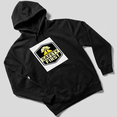Bold graphic shirt featuring a safety helmet and the text Safety First — printed on a unisex hoodie