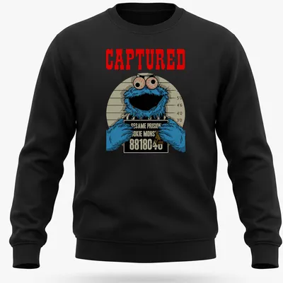Cartoon mugshot of Cookie Monster with humorous text in blue, red, and black — printed on a unisex sweatshirt