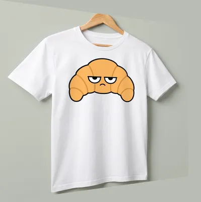 Cartoon croissant with the text 'Resting Bitch Face' in funny typography — printed on a unisex t-shirt (angled view)