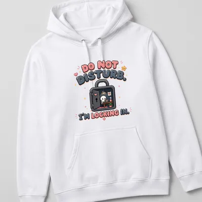 Kawaii pixel art of a cute skeleton with the text 'DO NOT DISTURB. I’M LOCKING IN.' — printed on a unisex hoodie