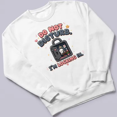 Kawaii pixel art of a cute skeleton with the text 'DO NOT DISTURB. I’M LOCKING IN.' — printed on a unisex sweatshirt