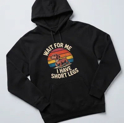 Funny Dachshund t-shirt with retro design and colorful text about short legs — printed on a unisex hoodie