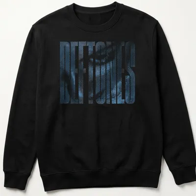 Halftone printed text 'DEFTONES' in blue on a retro style — printed on a unisex sweatshirt