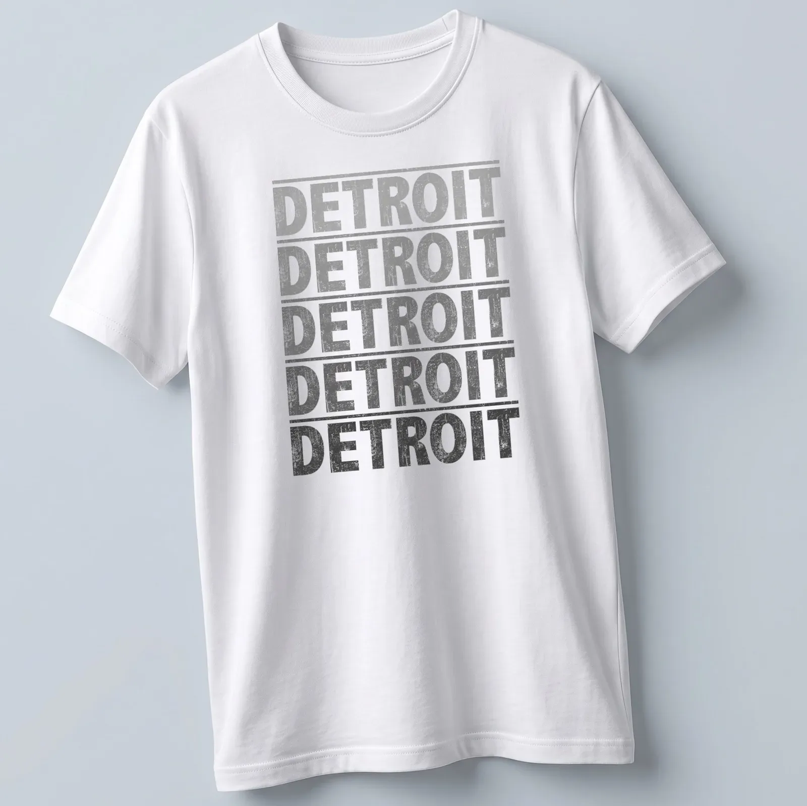 Distressed vintage Detroit t-shirt featuring bold slab lettering — printed on a unisex t-shirt