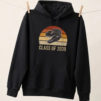 Retro distressed tee featuring a dinosaur skull and 'Class of 2039' text — printed on a unisex hoodie