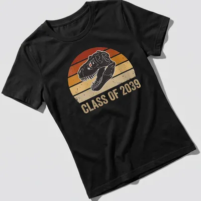 Retro distressed tee featuring a dinosaur skull and 'Class of 2039' text — printed on a women's shirt