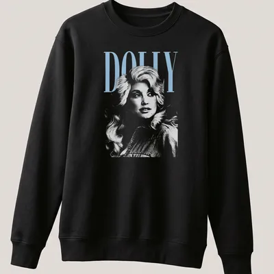 Vintage Dolly Parton t-shirt featuring the name Dolly in a classic font — printed on a unisex sweatshirt