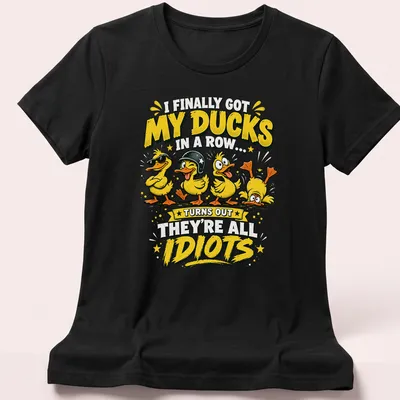 Cartoon ducks with humorous text about organization and chaos — printed on a women's shirt