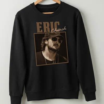 Sepia-tone Eric Church t-shirt with bold lettering in brown and cream — printed on a unisex sweatshirt