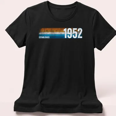 Vintage retro t-shirt with Established 1952 text in orange, blue, and white — printed on a women's shirt