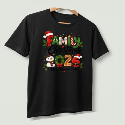 Festive snowman t-shirt with Christmas text and colorful design — printed on a unisex t-shirt (angled view)