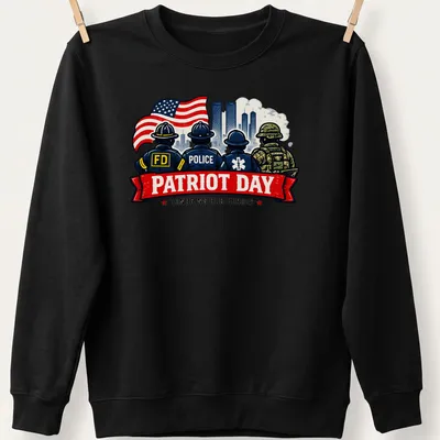 Vintage illustration of first responders with the text 'Patriot Day Honoring Our Heroes' in bold colors. — printed on a unisex sweatshirt