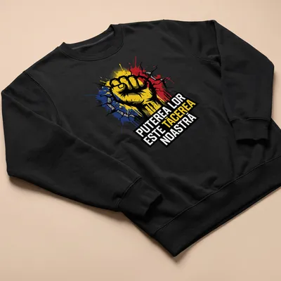 Bold graphic t-shirt featuring a fist with the text Puterea Lor Este TăCerea Noastră in yellow, black, blue, and red — printed on a unisex sweatshirt