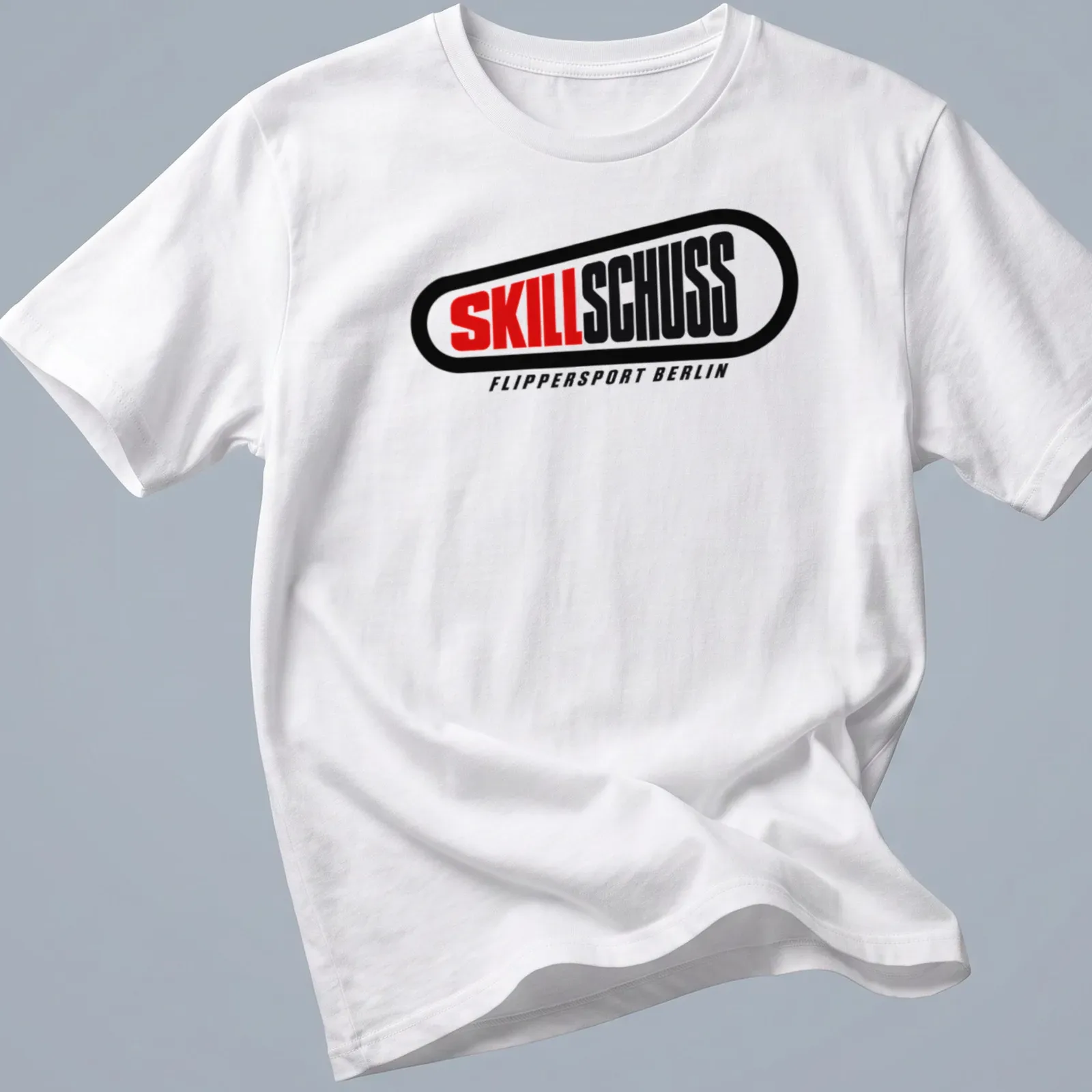 Bold modern t-shirt displaying the Skillschuss Flippersport Berlin logo in black, red, and white. — printed on a unisex t-shirt