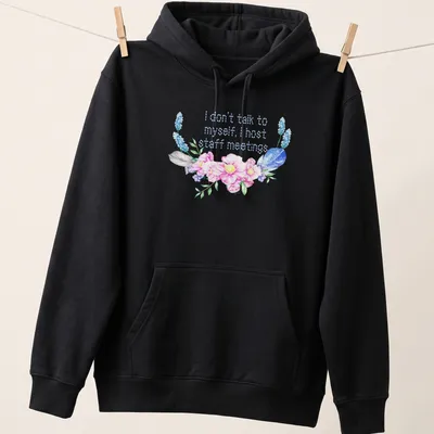 Floral design with humorous text about hosting staff meetings. — printed on a unisex hoodie
