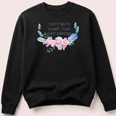 Floral design with humorous text about hosting staff meetings. — printed on a unisex sweatshirt