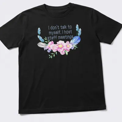 Floral design with humorous text about hosting staff meetings.