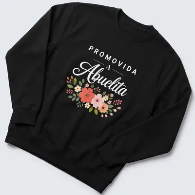 Whimsical floral arrangement with the text 'PROMOVIDA A Abuelita' above it — printed on a unisex sweatshirt