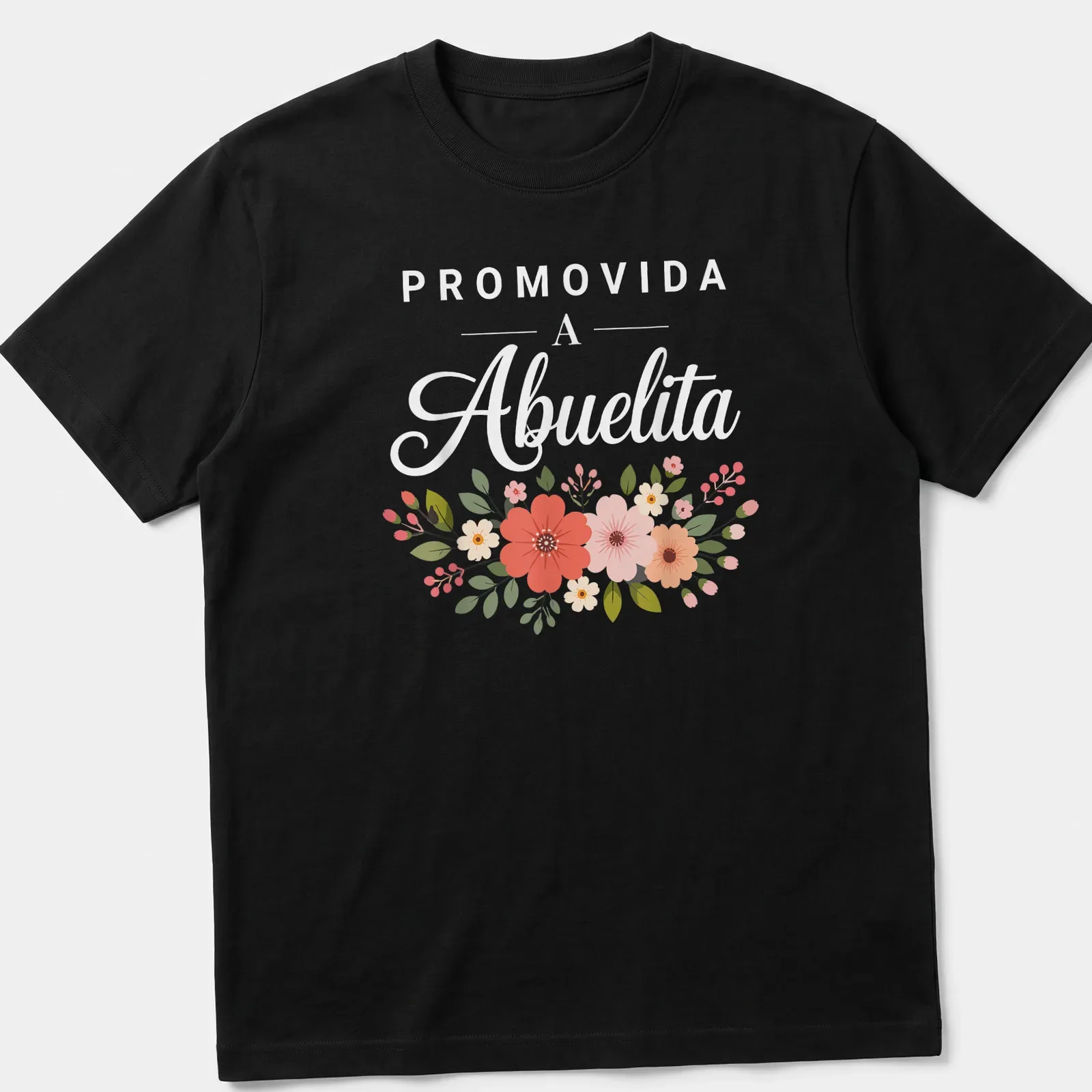 Whimsical floral arrangement with the text 'PROMOVIDA A Abuelita' above it — printed on a unisex t-shirt